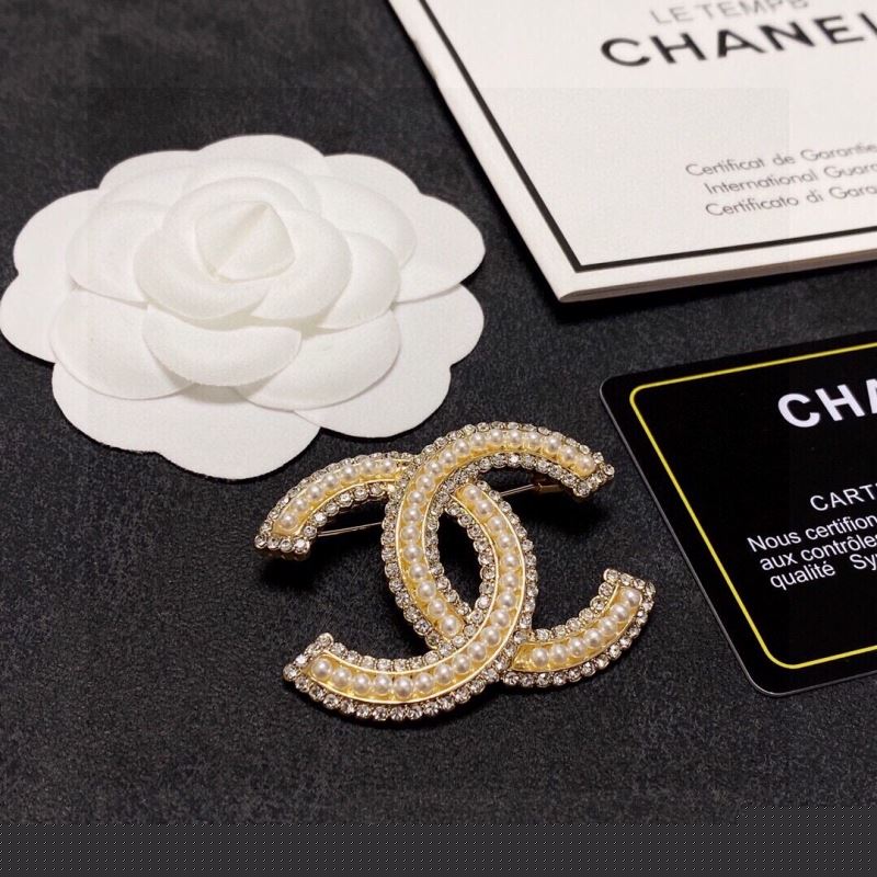 Ch*el brooches